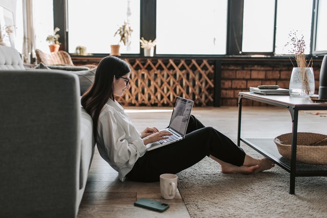 Woman working in lounge